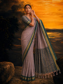 Minimal zari border saree with all-over butti and elegant woven pallu